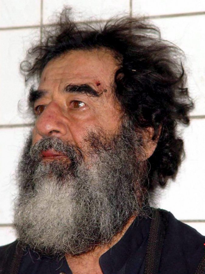 epa00893295 A US military handout photo shows the former leader of Iraq Saddam Hussein after he was captured  by US military forces 15 kilometers outside Tikrit, 13 December 2003. Former Iraqi dictator Saddam Hussein was executed early Saturday 30 December 2006, Iraqi television reported. The execution came just four days after an Iraqi court upheld the death sentence handed down after Saddam was convicted for the 1982 massacre in the Iraqi city of Dujail.  EPA/COMBINED JOINT TASK FORCE-7/HO