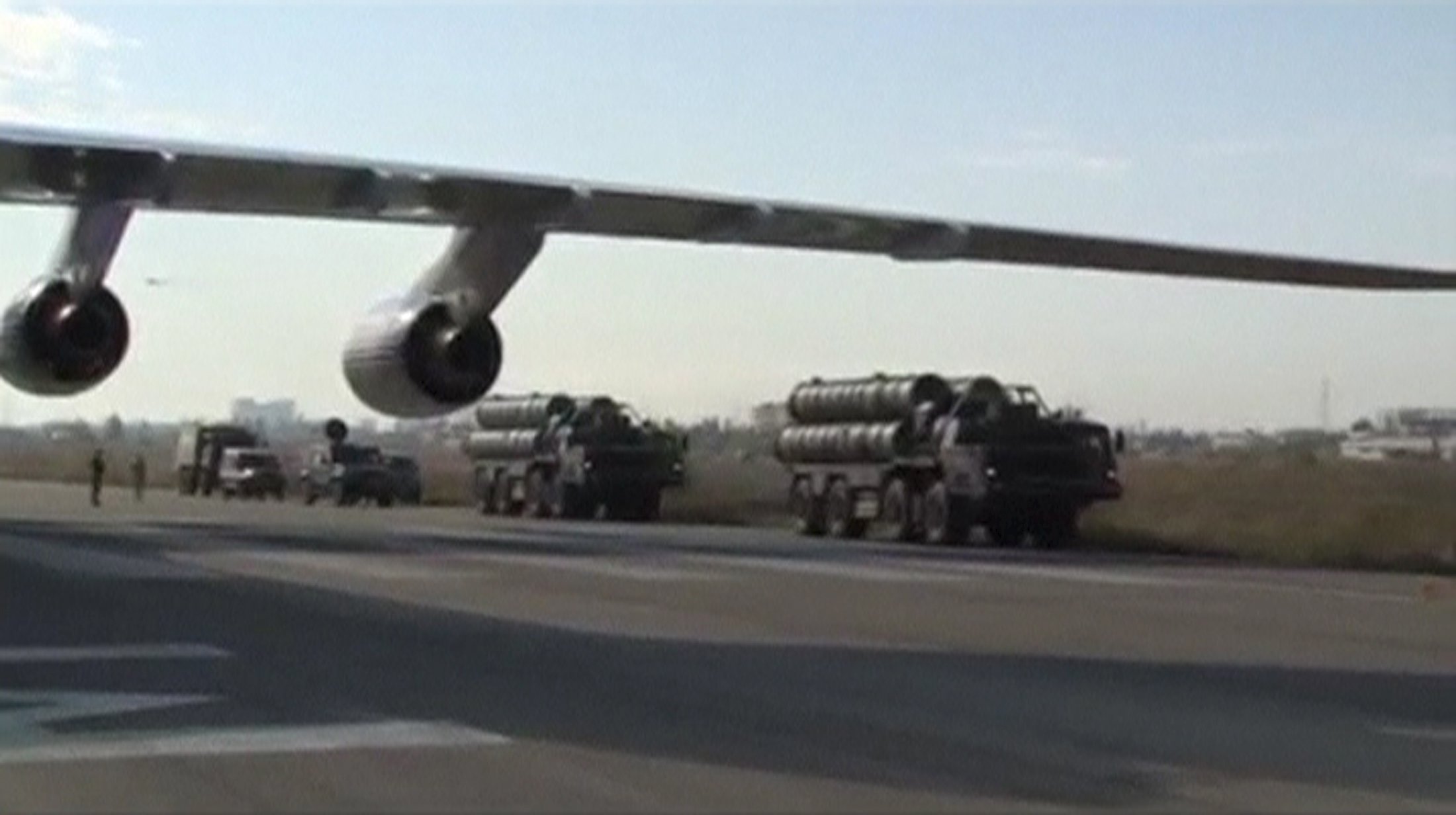 A frame grab shows S-400 defense missile systems driving at Hmeymim airbase