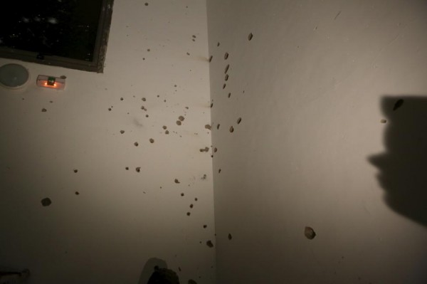 Bullet holes are seen at a staircase of the Radisson hotel in Bamako