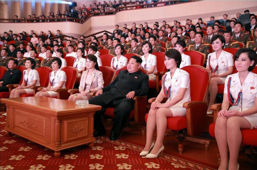 epa04983608 An undated picture released by Rodong Sinmun newspaper, the state-run North Korean newspaper of the ruling Workers Party, on 19 October 2015 of North Korean leader Kim Jong-un (3-R) and his wife Ri Sol-ju (4-R), along with members of an all-female music band, known as the Moranbong Band, watching a performance given by the Chongbong Band to mark the 70th anniversary of the founding of the ruling Workers' Party of Korea. It was not reported when or where the photo was taken.  EPA/Rodong Sinmun SOUTH KOREA OUT * BEST QUALITY AVAILABLE  EDITORIAL USE ONLY