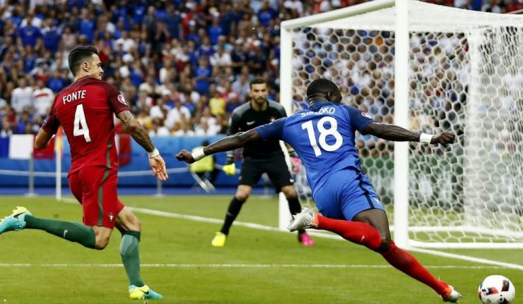 epa05419160 Moussa Sissoko (R) of France in action during the UEFA EURO 2016 Final match between Portugal and France at Stade de France in Saint-Denis, France, 10 July 2016.


(RESTRICTIONS APPLY: For editorial news reporting purposes only. Not used for commercial or marketing purposes without prior written approval of UEFA. Images must appear as still images and must not emulate match action video footage. Photographs published in online publications (whether via the Internet or otherwise) shall have an interval of at least 20 seconds between the posting.)  EPA/ABEDIN TAHERKENAREH   EDITORIAL USE ONLY