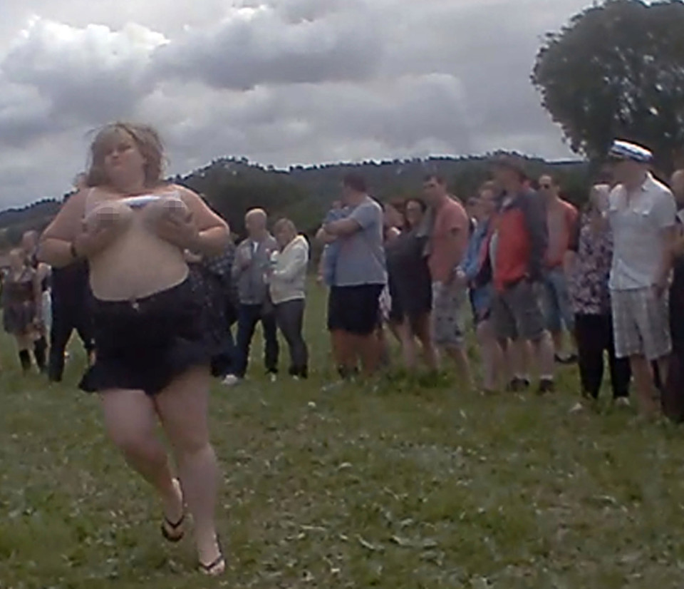 Europe's largest gathering of 'swingers' meet at their annual get-together - Swingfields - held in the tiny village of Trellech, near Monmouth, Wales. The wet t-shirt competition. Pic © Neil Hope/www.divingimages.co.uk Tel: 01752 814338 Mob: 07505 263 011 Email: neil.hope@taltalk.net Web: www.divingimages.co.uk