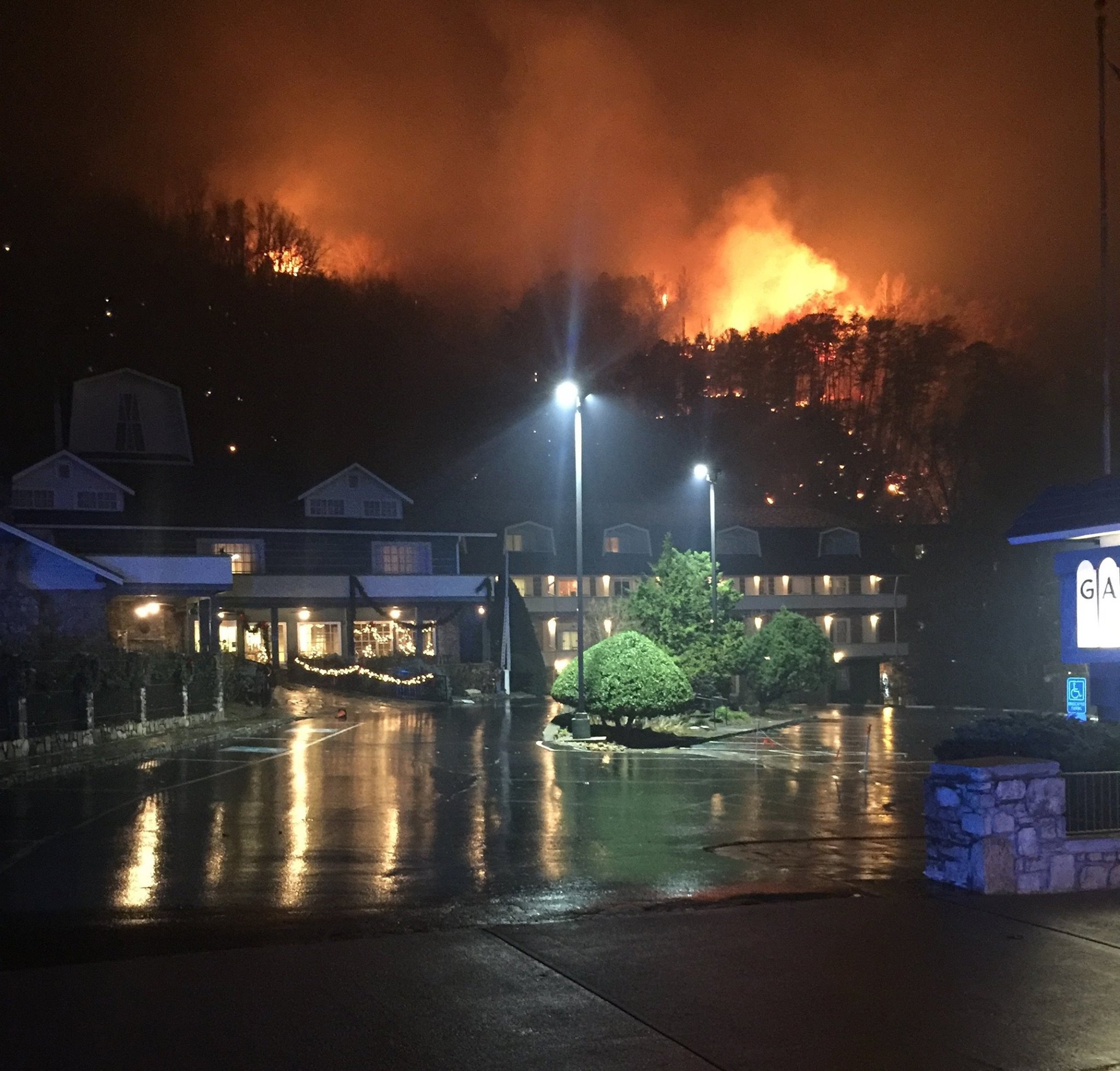 A wildfire burns on a hillside after a mandatory evacuation was ordered in Gatlinburg, Tennessee in a picture released November 30, 2016.   Tennessee Highway Patrol/Handout via REUTERS   ATTENTION EDITORS - THIS IMAGE WAS PROVIDED BY A THIRD PARTY. EDITORIAL USE ONLY