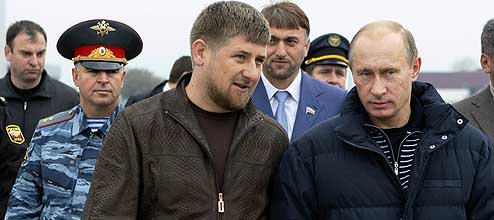 Russian Prime Minister Vladimir Putin, right, listens to Chechen regional President Ramzan Kadyrov in Grozny, Chechnya, Thursday, Oct. 16, 2008. Putin arrived in Chechnya for a working tour. (AP Photo/RIA-Novosti, Alexei Nikolsky, Pool)