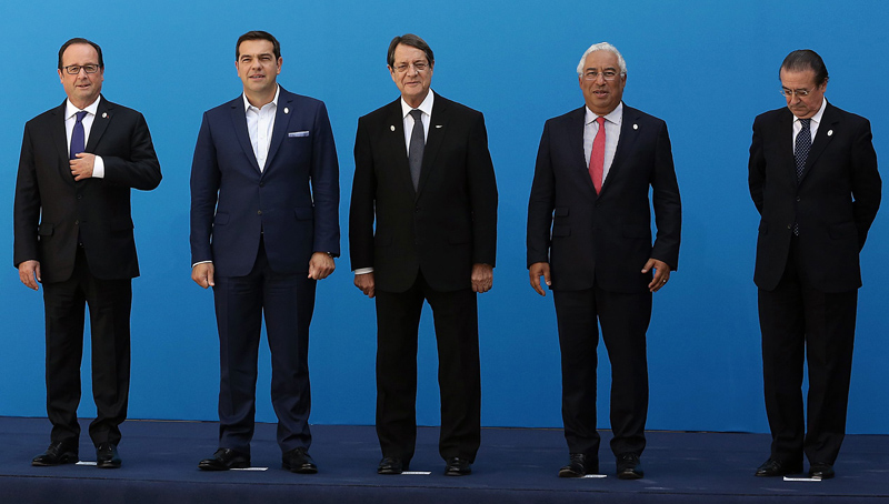 epa05531728 Greek Prime Minister Alexis Tsipras (C) poses for a photo with French President Francois Hollande (3-L), Italian Prime Minister Matteo Renzi (2-L), Maltese Prime Minister Joseph Muscat (L), Cyprus President Nicos Anastasiades (3-R), Portuguese Prime Minister Antonio Costa (2-R) and Spain's State Secretary for the European Union Fernando Eguidazu (R) during a family photo at Zappeion Mansion in Athens, Greece, 09 September 2016. Alexis Tsipras called a Mediterranean EU member-states leaders' meeting in Athens for dealing with joint challenges relating to migration, security and the economy, ahead of the informal European Council in Bratislava on September 16.  EPA/SIMELA PANTZARTZI