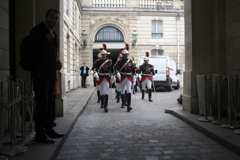 Republican guards arrive for the Emmanuel Macron's formal inauguration ceremony as French President, in Paris, Sunday, May 14, 2017. Macron will officially take power on Sunday following an inauguration ceremony with his predecessor Hollande at the Elysee presidential palace in Paris. (AP Photo/Thibault Camus)