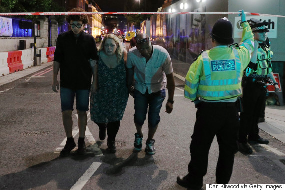 LONDON, ENGLAND - JUNE 03: Members of the public are led away from the scene near London Bridge after a suspected terrorist attack on June 4, 2017 in London, England. Police responded to what they are calling terrorist attacks on London Bridge and Borough Market where at least 20 people were injured and one person was killed. (Photo by Dan Kitwood/Getty Images)