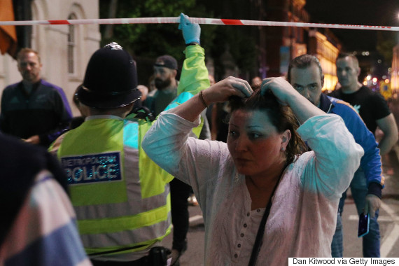 LONDON, ENGLAND - JUNE 03: Members of the public are led away from the scene near London Bridge after a suspected terrorist attack on June 4, 2017 in London, England. Police responded to what they are calling terrorist attacks on London Bridge and Borough Market where at least 20 people were injured and one person was killed. (Photo by Dan Kitwood/Getty Images)