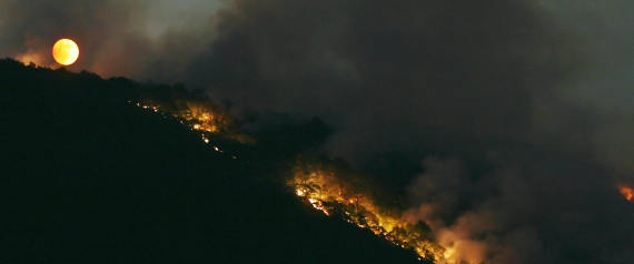 Fires burn on the mountain of Dajti nera the village of Priske, some 15 Kilometers from Tirana, 28 August 2007. Albania has battled multiple forest fires since June after several heat waves and months of drought. AFP PHOTO / GENT SHKULLAKU (Photo credit should read GENT SHKULLAKU/AFP/Getty Images)