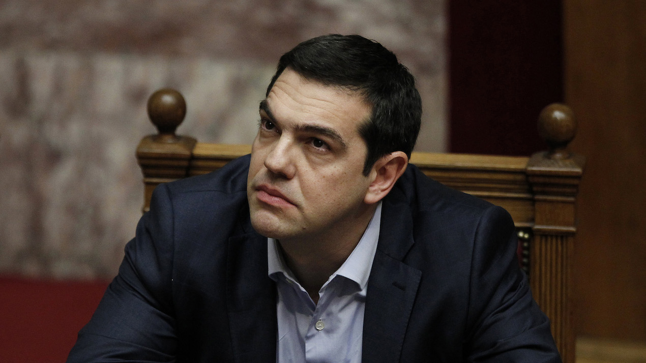 Alexis Tsipras, Greece's prime minister, looks on prior to speaking to lawmakers in Athens, Greece, on Monday, March 30, 2015. "The Greek government's strategy of isolating Germany and getting a majority of other euro-zone members to support another package against vague promises and no coherent reform plan has failed spectacularly," Erik Nielsen, global chief economist at UniCredit Bank AG, said in a note on Sunday. Photographer: Kostas Tsironis/Bloomberg *** Local Caption *** Alexis Tsipras