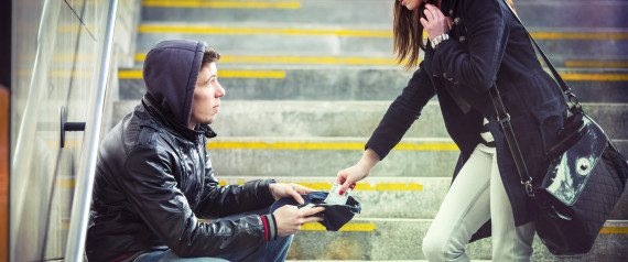 Young adult begging on the streets of Europe.