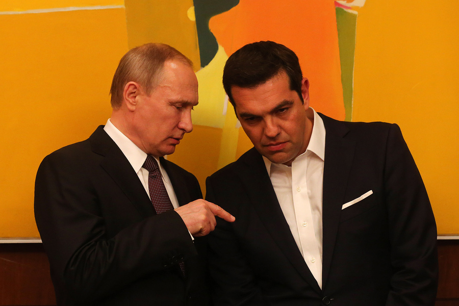 Greek Prime Minister Alexis Tsipras (R) talks with President of the Russian Federation Vladimir Putin (L) during their meeting in Athens on 27 May 2016. VladimirPutin is in Greece on a two days visit. EPA/ANA-MPA/ORESTIS PANAGIOTOU