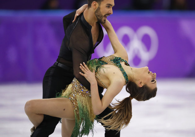 Figure Skating - Pyeongchang 2018 Winter Olympics - Ice Dance short dance competition - Gangneung Ice Arena - Gangneung, South Korea - February 19, 2018 - Guillaume Cizeron and Gabriella Papadakis of France perform. REUTERS/Phil Noble