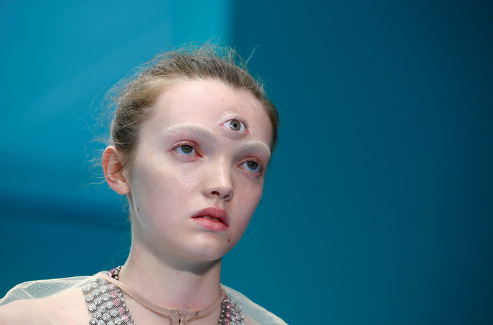 A model presents a creation from the Gucci Autumn/Winter 2018 women collection during Milan Fashion Week in Milan, Italy February 21, 2018. REUTERS/Tony Gentile