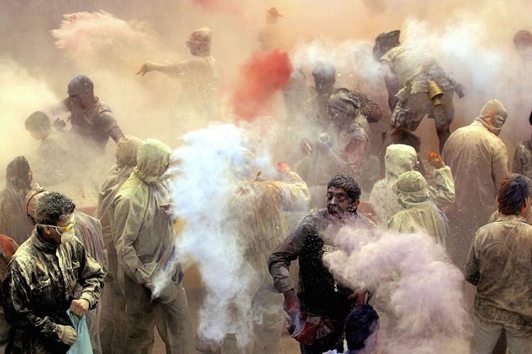 GALAXIDI, GREECE - MARCH 06: Local revellers celebrate "Clean Monday" with a colourful "flour-war", traditionally marking the end of the carnival season on March 06, 2006 in Galaxidi, Greece. Clean Monday sees the climax to carnival season and the start of lent. (Photo by Milos Bicanski/Getty Images)