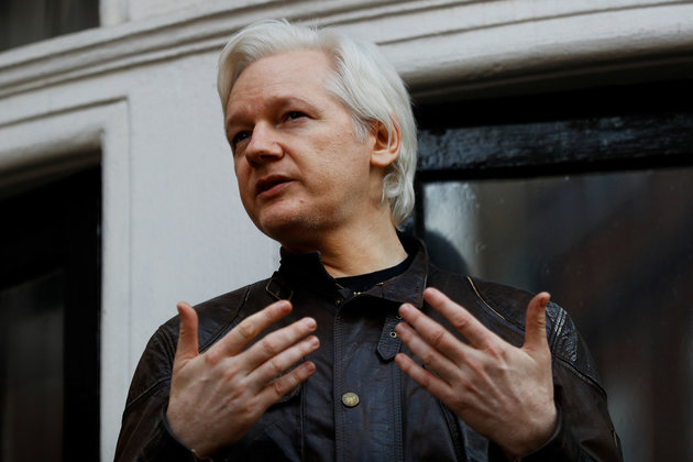 WikiLeaks founder Julian Assange is seen on the balcony of the Ecuadorian Embassy in London, Britain, May 19, 2017. REUTERS/Peter Nicholls