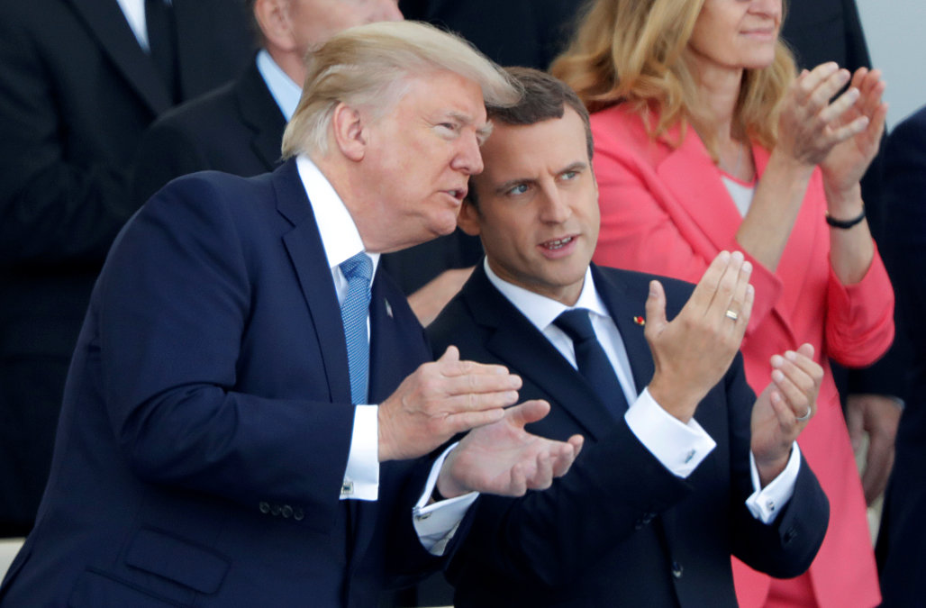 French President Emmanuel Macron and U.S. President Donald Trump attend the traditional Bastille Day military parade on the Champs-Elysees in Paris, France, July 14, 2017. REUTERS/Charles Platiau