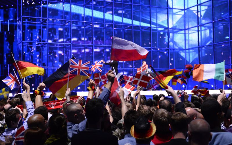 Supporters wave flags ahead of the Eurovision Song Contest 2014 Grand Final in Copenhagen, Denmark, on May 10, 2014. AFP PHOTO/JONATHAN NACKSTRAND        (Photo credit should read JONATHAN NACKSTRAND/AFP/Getty Images)