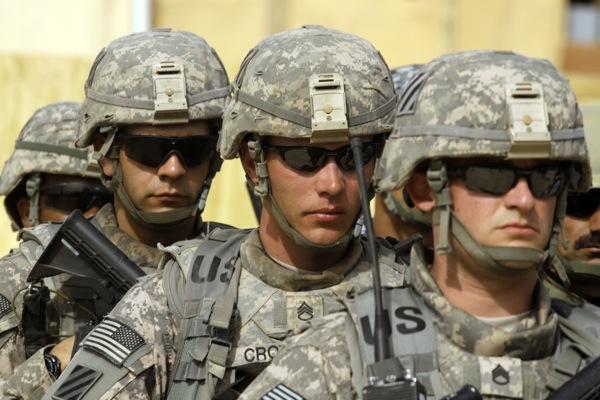 In this photo taken Monday, Feb. 15, 2010, U.S. Army soldiers from 1st Battalion, 30th Infantry Regiment are seen at a ceremony launching the Combined Security Force on Kirkuk, north of Baghdad, Iraq. The U.S. military mission in Iraq will soon be getting a new name. As of Sept. 1, Operation Iraqi Freedom becomes Operation New Dawn. Defense Secretary Robert Gates said in a memo Wednesday that the name change will send a strong signal that American forces have a new mission, which recognizes "our evolving relationship" with the government in Baghdad. (AP Photo/Maya Alleruzzo)