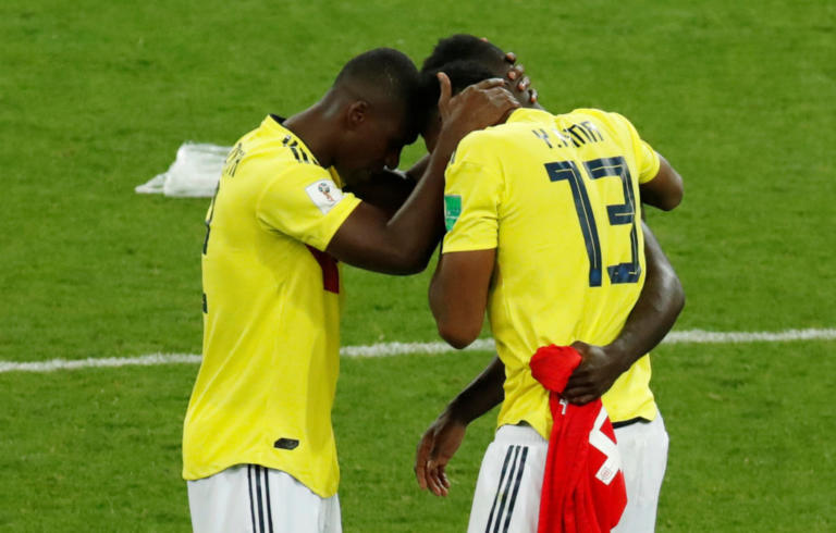 Soccer Football - World Cup - Round of 16 - Colombia vs England - Spartak Stadium, Moscow, Russia - July 3, 2018  Colombia's Yerry Mina and team mates look dejected after the match                                                          REUTERS/Christian Hartmann