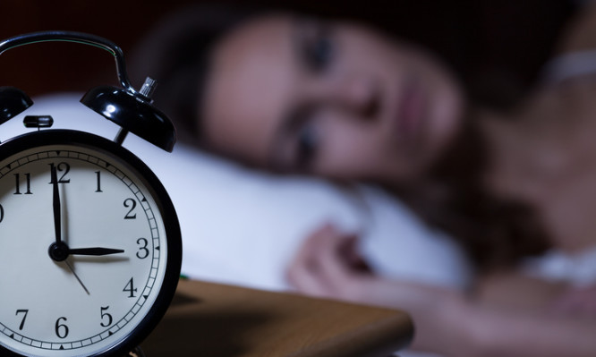 Alarm clock on night table