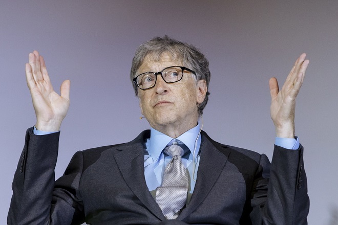 epa07095341 Microsoft founder and co-founder of the Bill and Melinda Gates Foundation Bill Gates gestures as he talks during a conference about the innovations for a healthy future in Africa, at the Technical University (TU) in Berlin, Germany, 15 October 2018. Bill Gates is in Germany for the 'World Health Summit', which started in Berlin on 14 October and ends on 16 October.  EPA/KAMIL ZIHNIOGLU