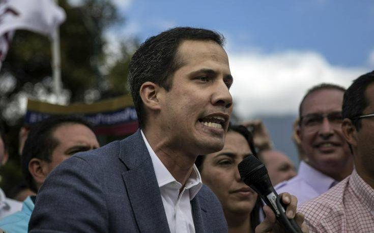 Venezuela's self-declared interim leader Juan Guaido speaks to supporters in a public plaza in Las Mercedes neighborhood of Caracas, Venezuela, Saturday, Jan. 26, 2019. Venezuela's political showdown moves to the United Nations where a Security Council meeting called by the United States will pit backers of President Nicolas Maduro against the Trump administration and supporters of Guaido. (AP Photo/Rodrigo Abd)