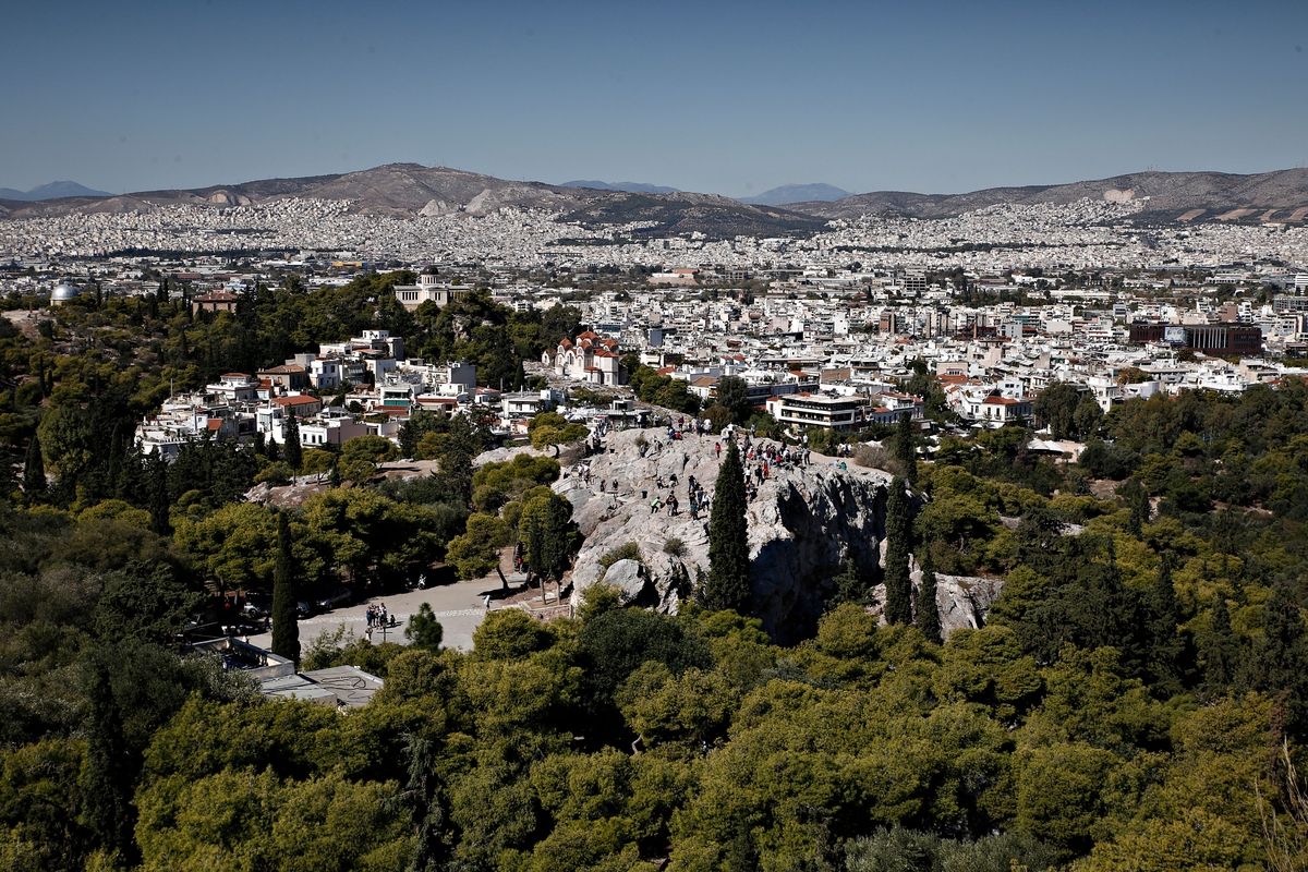 Tourists visit the Acropolis hill in Athens, Greece on Oct. 12, 2017