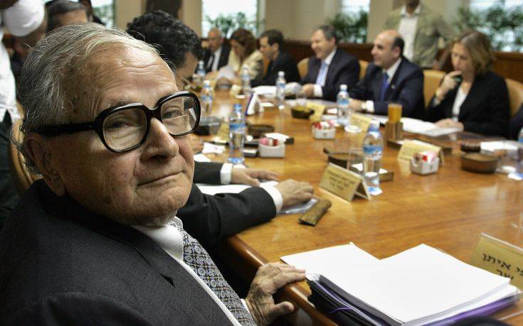 Israel incoming Minister of Pensioners Affairs Rafi Eitan, left, attends the first weekly cabinet meeting of the new Israeli coalition government in Jerusalem Sunday May 7,  2006. The new Isreali 25-member cabinet was sworn in last week. (AP Photo/Yoav Lemmer, Pool)