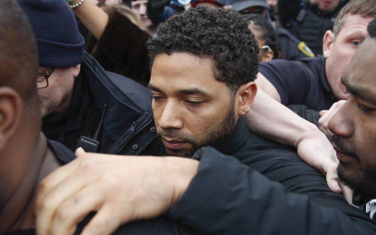 FILE - In this Feb. 21, 2019 file photo, Jussie Smollett leaves George N Leighton Criminal Courthouse in Chicago. A lawyer for Smollett is asking a judge to allow the "Empire" actor to travel while he is free on bond on charges he falsely reported being attacked by two masked men. (AP Photo/Kamil Krzaczynski, File)