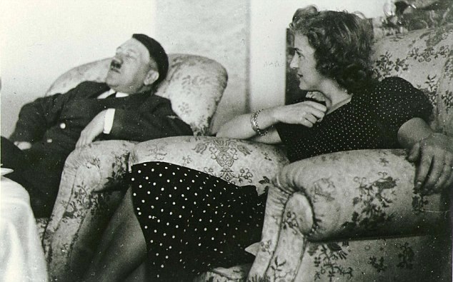 Hitler asleep, next to Eva Br.aun in the teahouse on the *Eagel,s Nest *in Berchtesgaden.Picture banned during Hitlers lifetime.