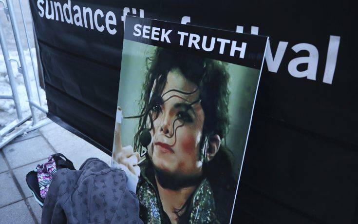 A sign in support of Michael Jackson is seen outside of the premiere of the "Leaving Neverland" Michael Jackson documentary film at the Egyptian Theatre on Main Street during the 2019 Sundance Film Festival, Friday, Jan. 25, 2019, in Park City, Utah. (Photo by Danny Moloshok/Invision/AP)