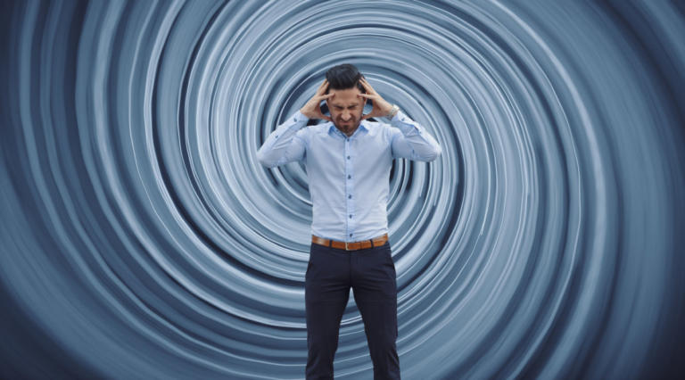 Businessman against vortex background.