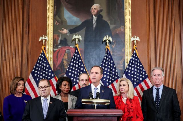 House Intelligence Chairman Adam Schiff (D-CA) speaks to reporters with House Speaker Nancy Pelosi (D-CA); House Judiciary Chairman Jerrold Nadler (D-NY); House Financial Services Chairwoman Maxine Waters (D-CA); House Foreign Affairs Chairman Eliot Engel (D-NY); House Oversight and Reform Chairwoman Carolyn Maloney (D-NY); and House Ways and Means Committee Chairman Richard Neal (D-MA)  during a news conference to announce artiicles of impeachment against U.S. President Donald Trump on Capitol Hill in Washington, U.S., December 10, 2019. REUTERS/Jonathan Ernst