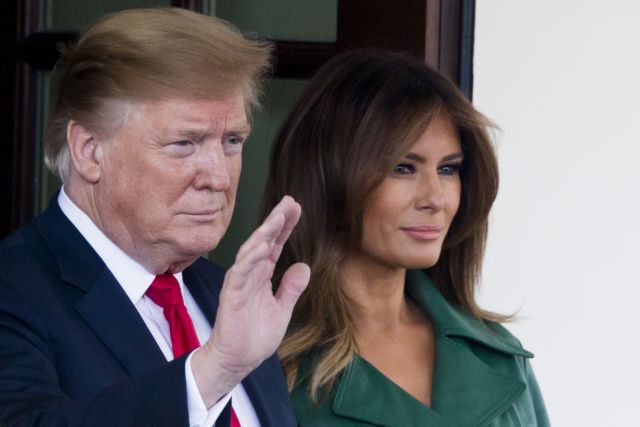 epa07420762 US President Donald J. Trump (L) and First Lady Melania Trump (R) watch the departure of Prime Minister of the Czech Republic Andrej Babis and his wife Monika Babisova (both unseen), outside the West Wing of the White House in Washington, DC, USA, 07 March 2019. Trump and Babis discussed bilateral trade and security issues.  EPA/MICHAEL REYNOLDS