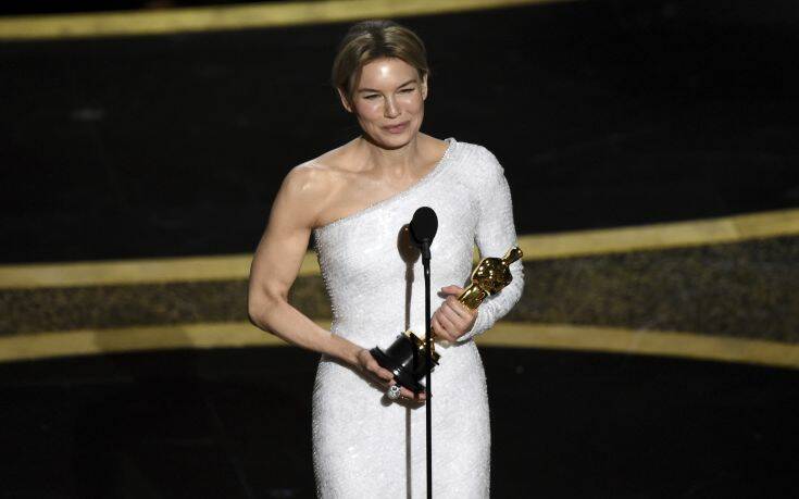 Renee Zellweger accepts the award for best performance by an actress in a leading role for "Judy" at the Oscars on Sunday, Feb. 9, 2020, at the Dolby Theatre in Los Angeles. (AP Photo/Chris Pizzello)