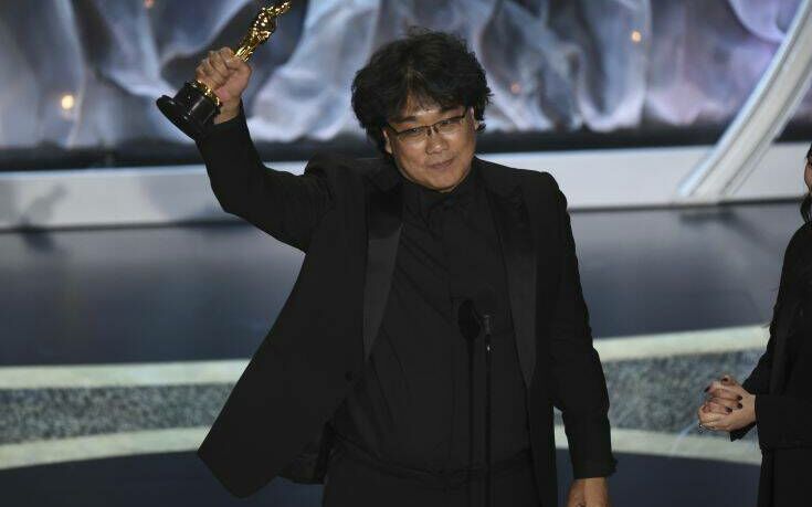 Bong Joon Ho accepts the award for best international feature film for "Parasite," from South Korea, at the Oscars on Sunday, Feb. 9, 2020, at the Dolby Theatre in Los Angeles. (AP Photo/Chris Pizzello)