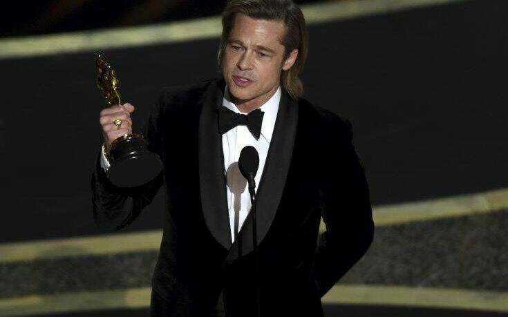 Brad Pitt accepts the award for best performance by an actor in a supporting role for "Once Upon a Time in Hollywood" at the Oscars on Sunday, Feb. 9, 2020, at the Dolby Theatre in Los Angeles. (AP Photo/Chris Pizzello)