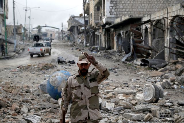 FILE PHOTO: A Syrian army soldier gestures in Maarat al-Numan, Syria, Jan. 30, 2020. REUTERS/Yamam Al Shaar/File Photo