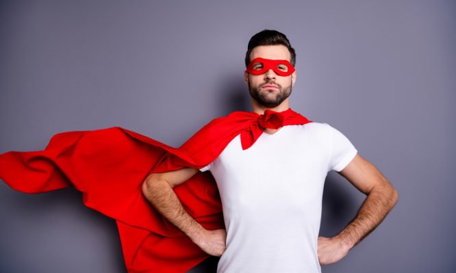 Portrait of his he nice-looking attractive content macho virile candid masculine brutal sportive perfect, bearded guy hands on hips ready to rescue isolated over gray pastel background