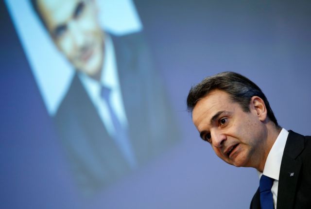 Greek Prime Minister Kyriakos Mitsotakis speaks during a German-Greek business forum in Berlin, Germany, March 9, 2020. REUTERS/Michele Tantussi