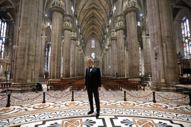 Italian opera singer Andrea Bocelli prepares for the ''Music for hope'' event, a streamed live performance intended as a symbol of love, hope and healing amidst the coronavirus disease (COVID-19) outbreak, on Easter Sunday, at an empty Duomo Cathedral in Milan, Italy, April 12, 2020. Luca Rossetti/Courtesy Sugar Srl/Decca Records/Handout via REUTERS  THIS IMAGE HAS BEEN SUPPLIED BY A THIRD PARTY. MANDATORY CREDIT. NO RESALES. NO NEW USAGE USE AFTER 23:59 GMT ON DECEMBER 31, 2020. IMAGE MUST BE USED IN ITS ENTIRETY - NO CROPPING OR OTHER MODIFICATIONS.