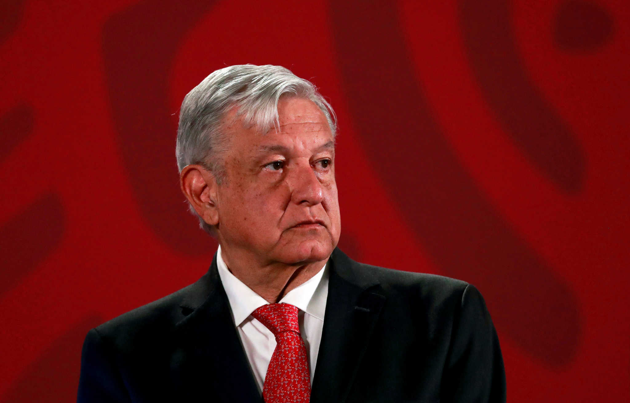 FILE PHOTO: Mexico's President Andres Manuel Lopez Obrador holds a news conference at the National Palace in Mexico City, Mexico, March 17, 2020. REUTERS/Henry Romero/File Photo