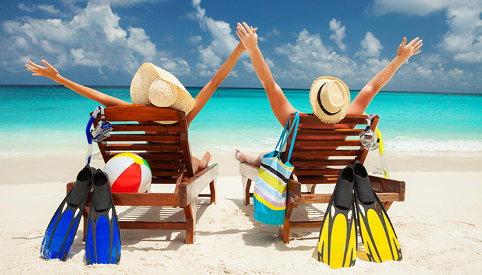 Happy couple on the beach of sea