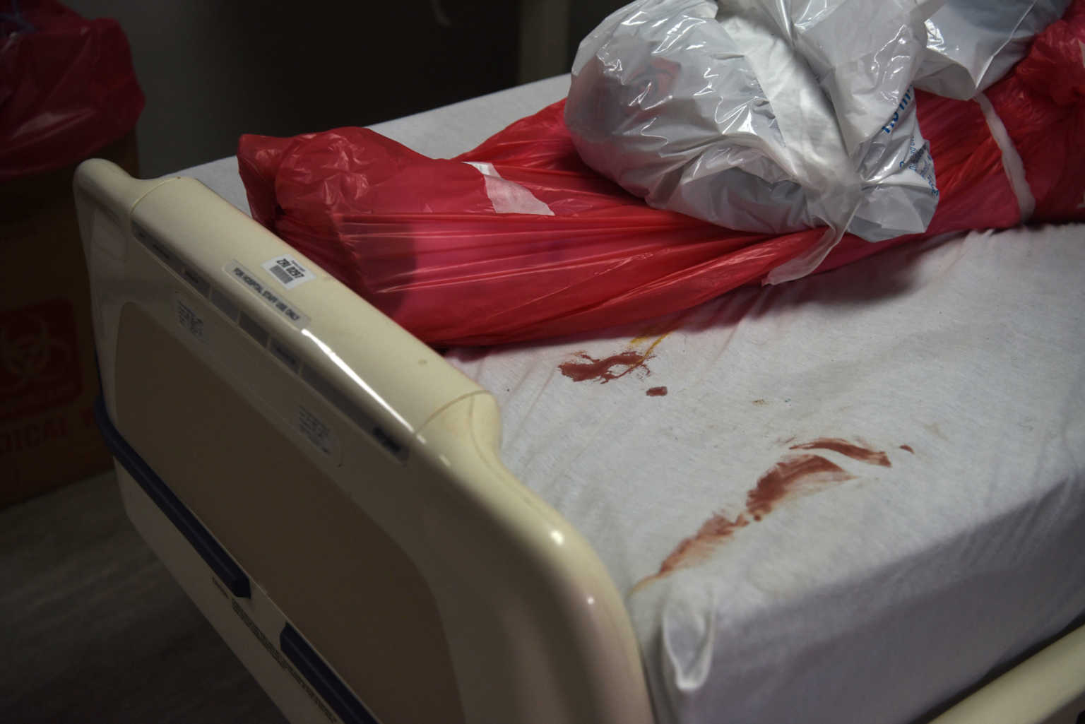 SENSITIVE MATERIAL. THIS IMAGE MAY OFFEND OR DISTURB A man who died from the coronavirus disease (COVID-19) is seen wrapped in a body bag at the United Memorial Medical Center's coronavirus disease (COVID-19) intensive care unit in Houston, Texas, U.S., June 29, 2020.  REUTERS/Callaghan O'Hare