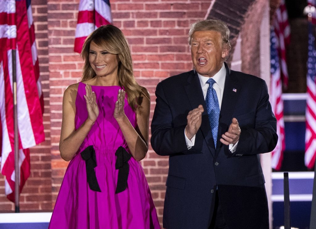 epa08628226 US President Donald J. Trump (R) and First Lady Melania Trump (L) attend the third night of the Republican National Convention, at Fort McHenry in Baltimore, Maryland, USA, 26 August 2020.  EPA/KEVIN DIETSCH / POOL