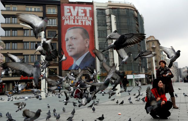 A campaign banner for the upcoming referendum with the picture of Turkish President Tayyip Erdogan is seen on Taksim square in central Istanbul, Turkey March 15, 2017. REUTERS/Murad Sezer