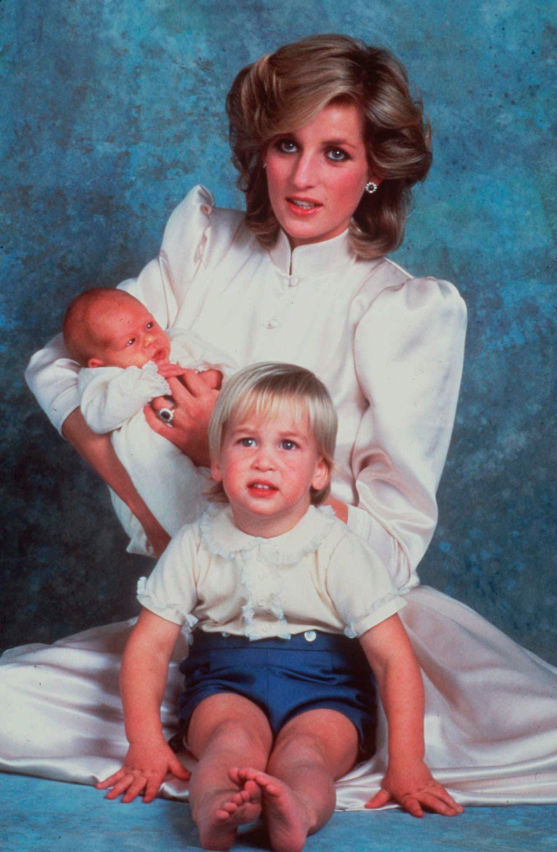 This is a 1984 file photo shows Britain's Princess Diana with sons Prince William, foreground, and Prince Harry. Long dismissed as a party boy, Prince Harry has transformed himself in the public eye and enjoys widespread popularity as he prepares to marry Meghan Markle on May 19, 2018. Harry has become a forceful advocate for veterans and won admiration by speaking openly about his struggle with the pain caused by the early death of his mother, Princess Diana. (AP Photo, file)