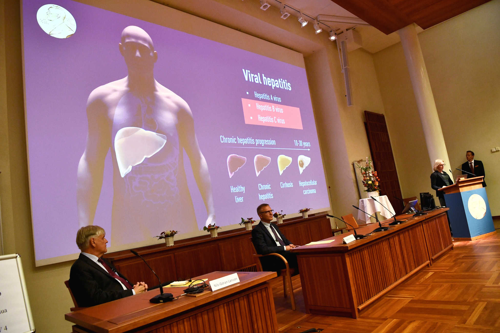 Nils-Goran Larsson, Patrik Ernfors, Gunilla Karlsson Hedestam and Thomas Perlmann (Secretary), of the Nobel Committee for Physiology or Medicine present the winners of the 2020 Nobel Prize in Physiology or Medicine Harvey J. Alter, Michael Houghton and Charles M. Rice, during a press conference at the Karolinska Institute in Stockholm, Sweden, October 5, 2020.  Claudio Bresciani/TT News Agency/via REUTERS      ATTENTION EDITORS - THIS IMAGE WAS PROVIDED BY A THIRD PARTY. SWEDEN OUT. NO COMMERCIAL OR EDITORIAL SALES IN SWEDEN.