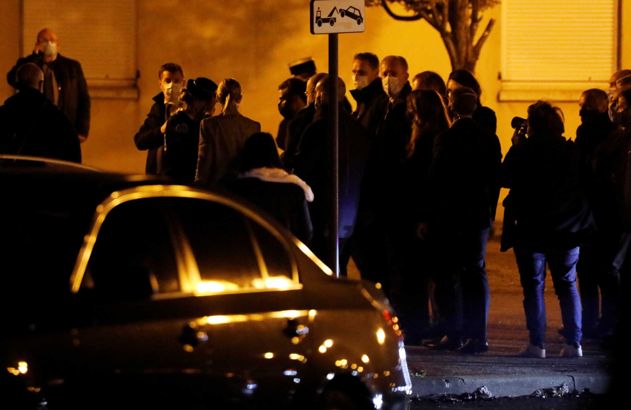 French President Emmanuel Macron arrives to visit the scene of a stabbing attack in the Paris suburb of Conflans St Honorine, France, October 16, 2020. REUTERS/Charles Platiau